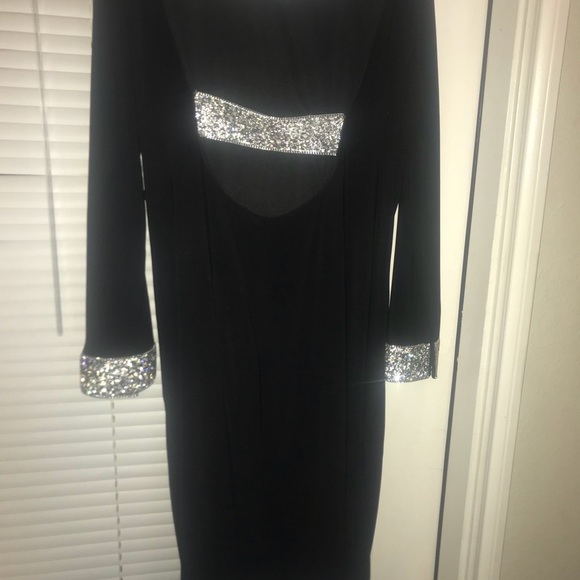 Black dress with sequined cuffs - Picture 1 of 2